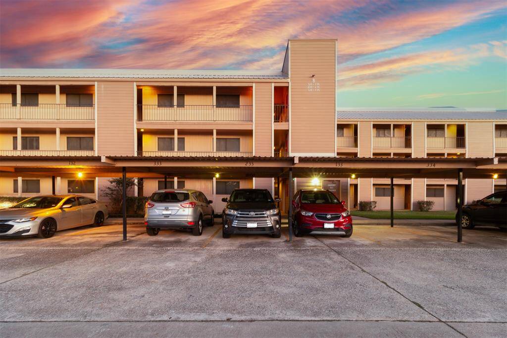 ASSIGNED COVERED PARKING SPACE JUST OUTSIDE YOUR FRONT DOOR!