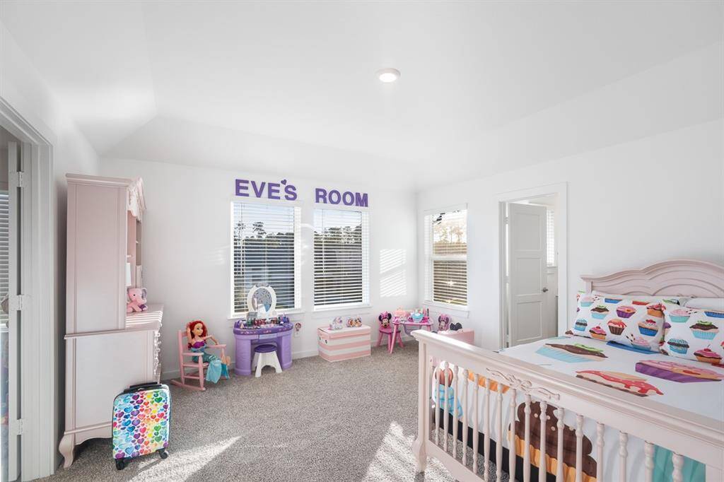 One of the secondary bedrooms with an en-suite bath. You will find all bedrooms are spacious and have fantastic closets!