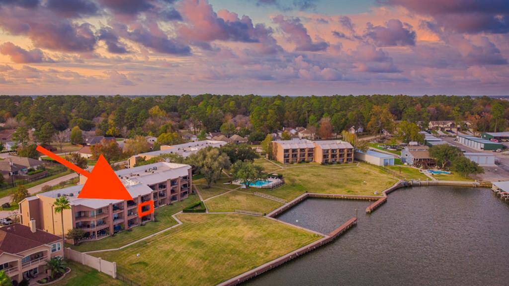 APRIL HARBOR COMMUNITY PROVIDES SECURITY AND PRIVACY! ARROW POINTS TO YOUR PRIVATE BALCONY! SHELTERED DOCKING AREA FOR YOUR BOAT OR JET SKI!