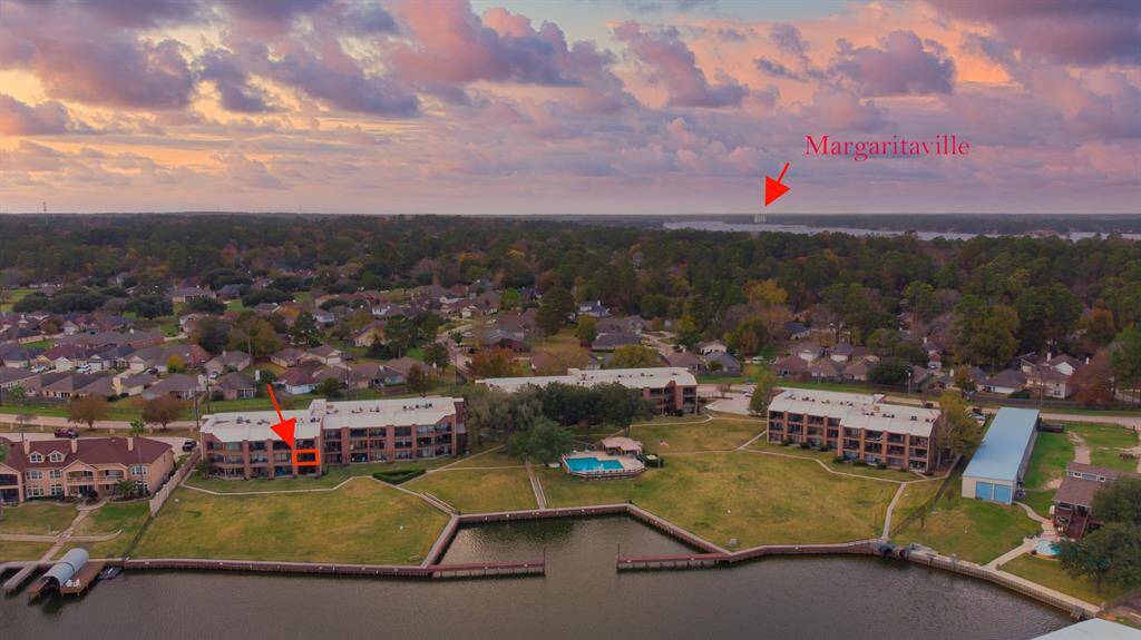APRIL HARBOR COMMUNITY PROVIDES SECURITY AND PRIVACY! ARROW POINTS TO YOUR PRIVATE BALCONY! SHELTERED DOCKING AREA FOR YOUR BOAT OR JET SKI! MARGARITAVILLE IS A FEW MINUTES AWAY!