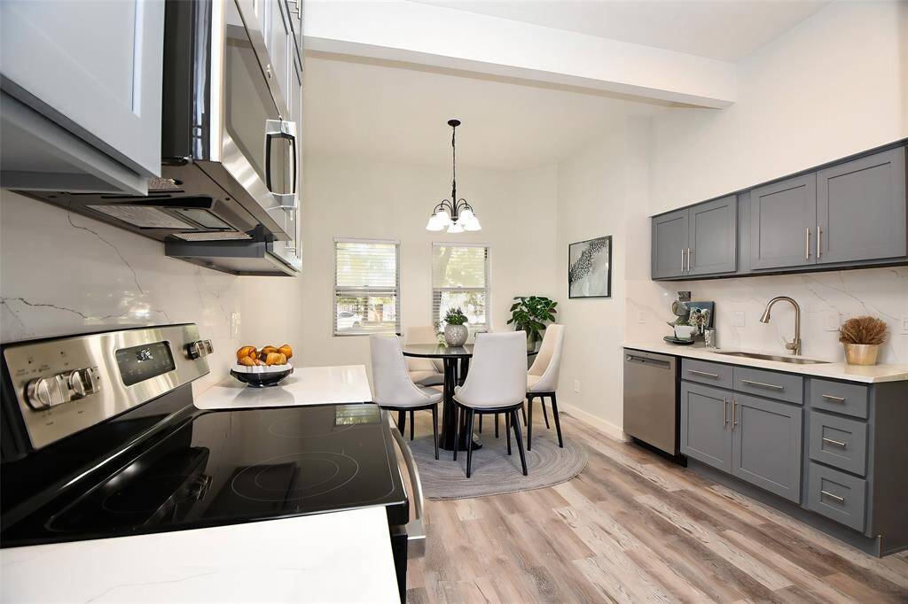 Kitchen looking into Breakfast Area