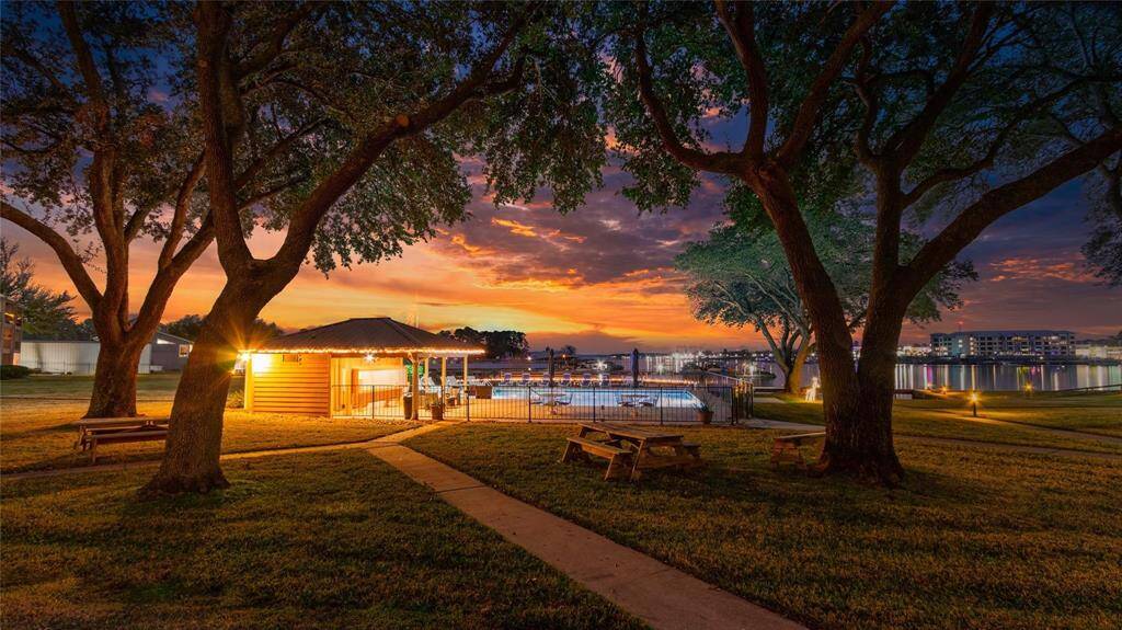 COMMUNITY POOL & NIGHT SKY OVER LAKE CONROE! GORGEOUS OLD GROWTH TREES!