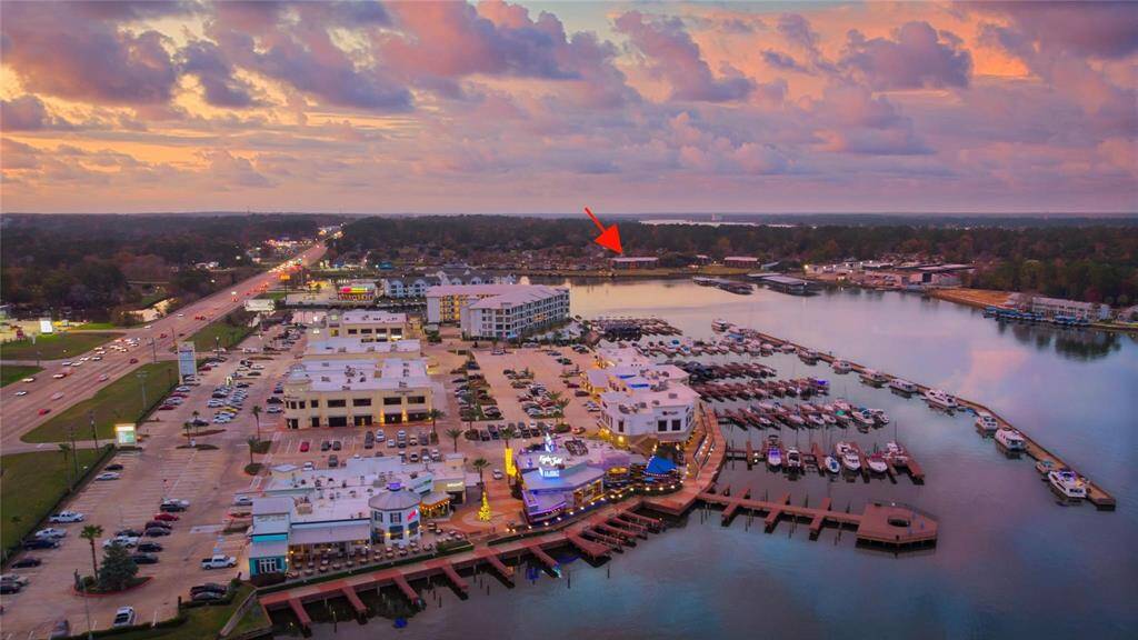 WATER POINT RESTAURANTS & RETAIL JUST ACROSS LAKE CONROE! ARROW POINTS TO YOUR NEW HOME! YOU WILL LOVE THE LAKE CONROE LIFESTYLE!