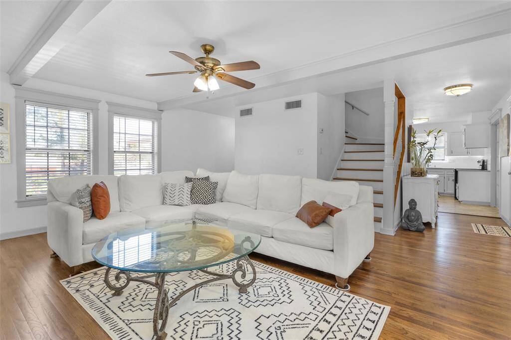 Brand-new Red Oak select flooring adds warmth to the downstairs living spaces.