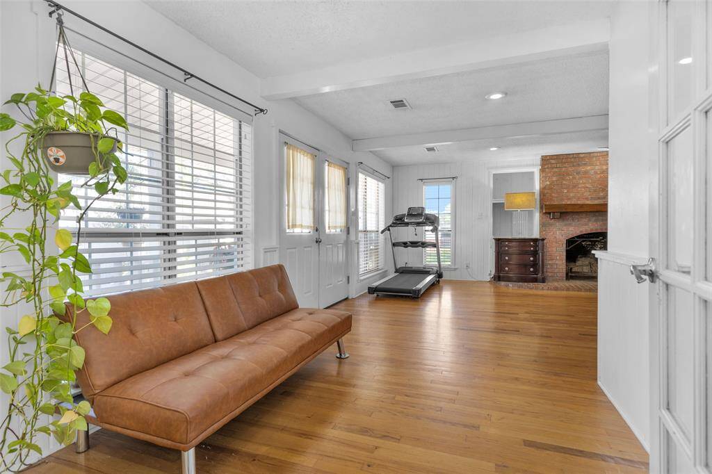This spacious primary suite lets in plenty of natural light.
