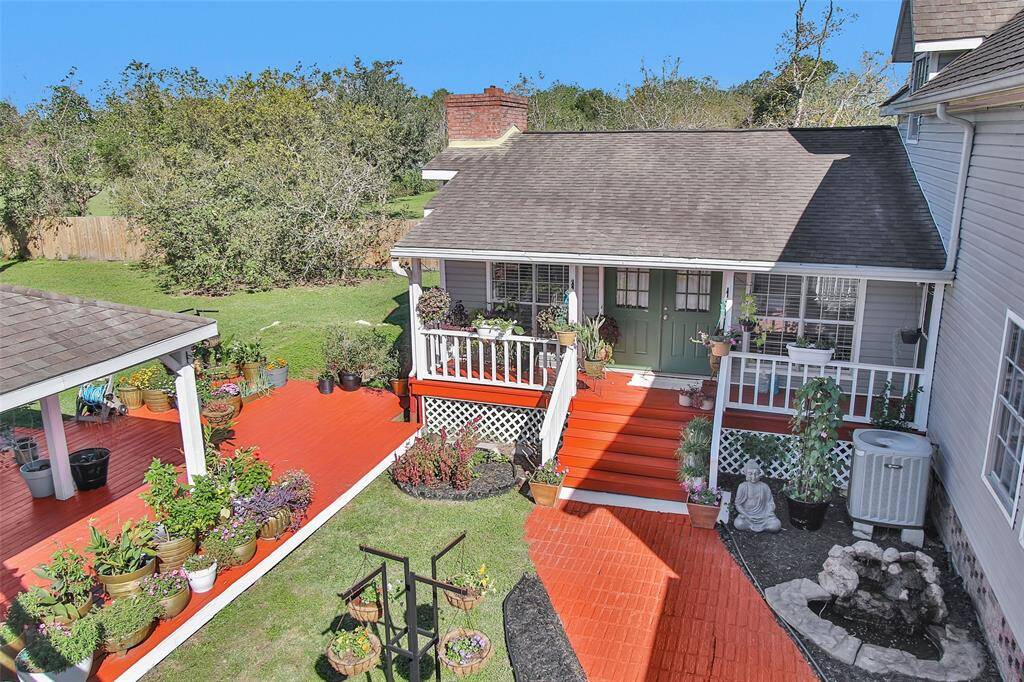 Step into this charming country Victorian home in Santa Fe, Texas