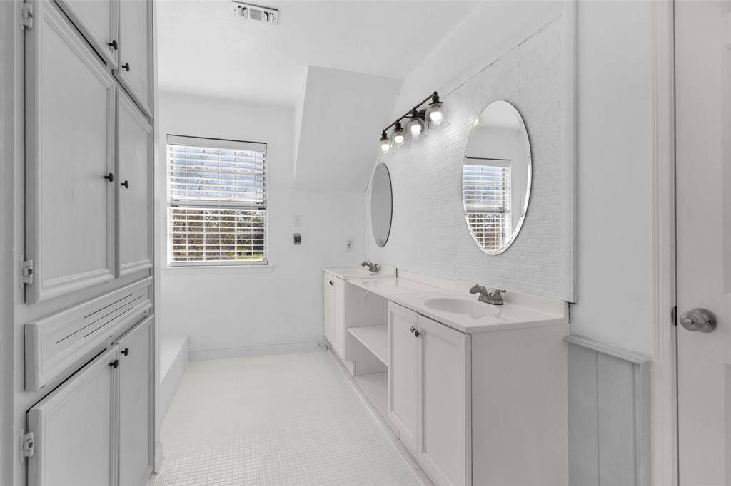 Back inside, this primary suite features a large and undated ensuite.