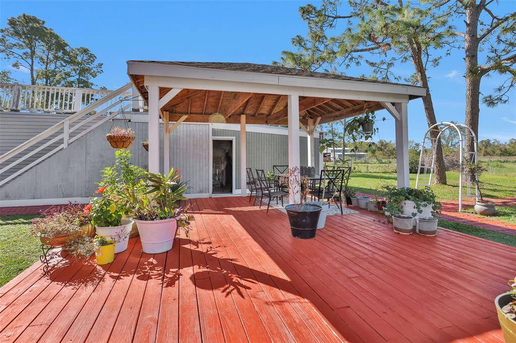 The large deck is right off the detached garage.