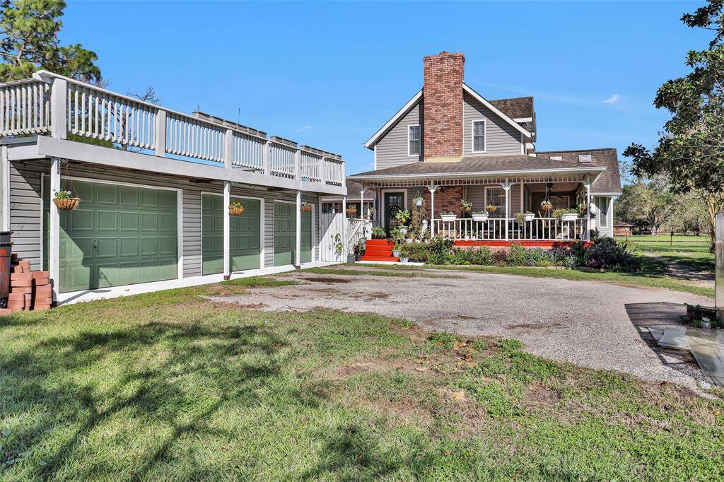 Plenty of storage available in this large 3-car detached garage. Plus a rooftop deck - perfect for stargazing.