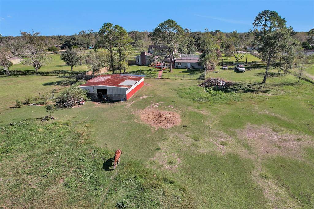 Rolling pastures add to the picturesque beauty of this home.