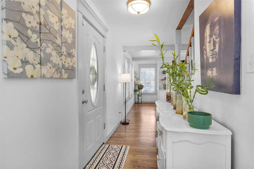 Enter into the foyer and head right to the kitchen, or left to a large family room.