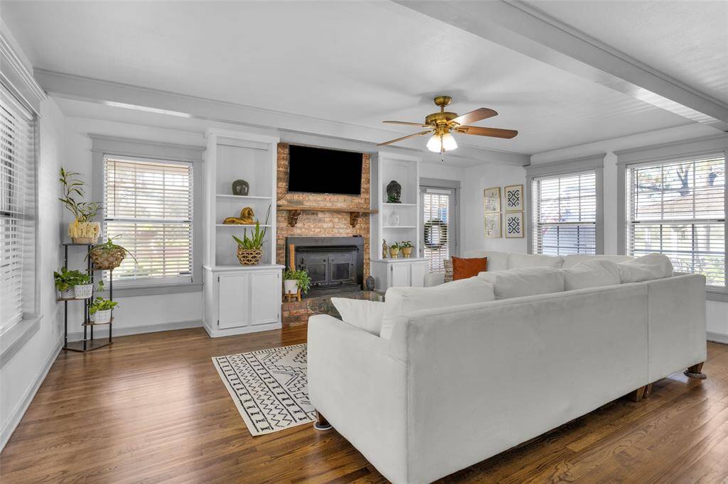 This fantastic living room is light and bright will still maximizing character and charm.