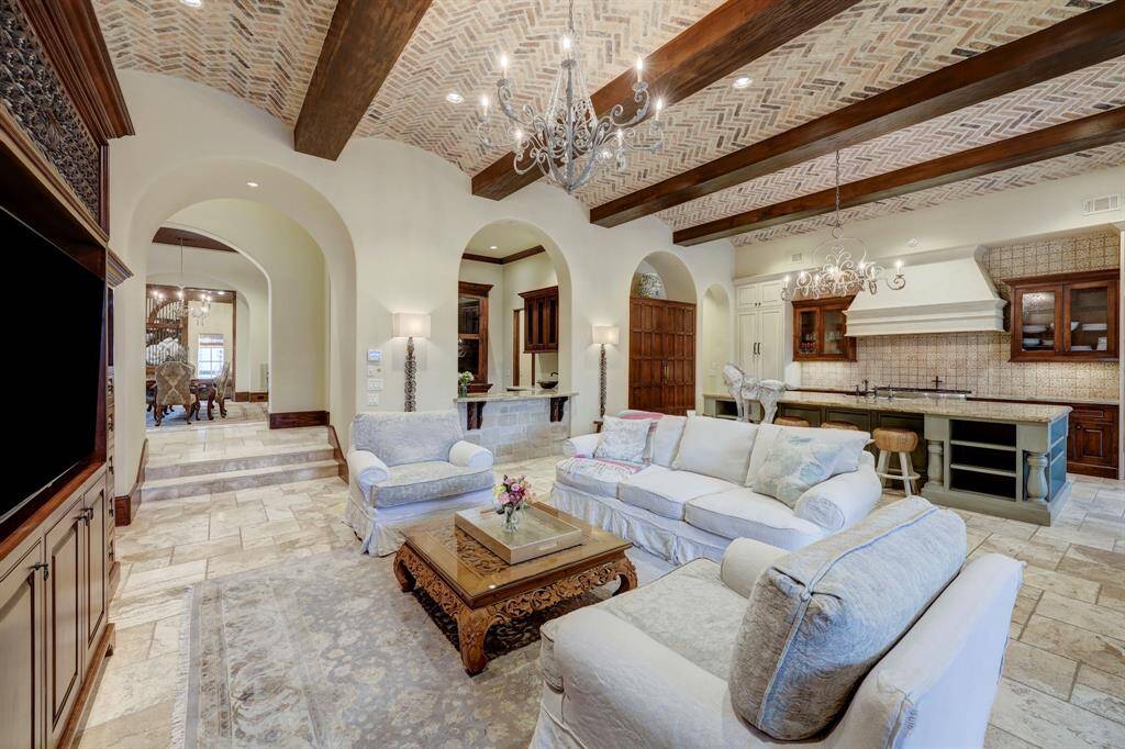 The timeless architectural details are seamlessly integrated with modern, sophisticated features, making this a truly must-see property