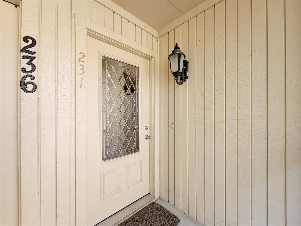 Beautiful beveled glass front door welcomes you home.