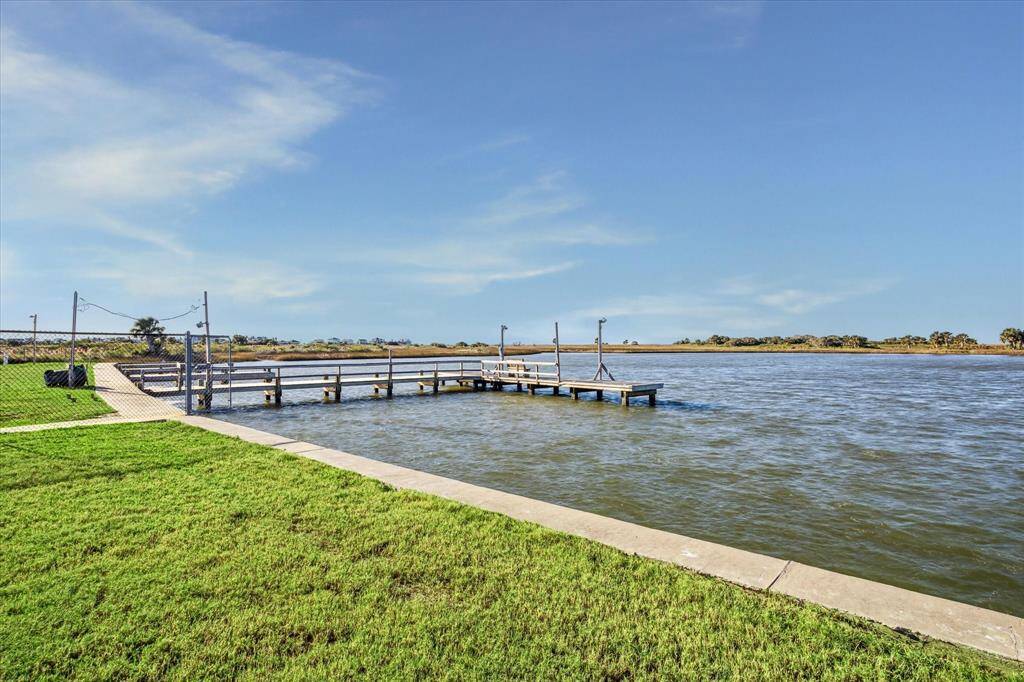 Neighborhood boat dock and boat ramp.
