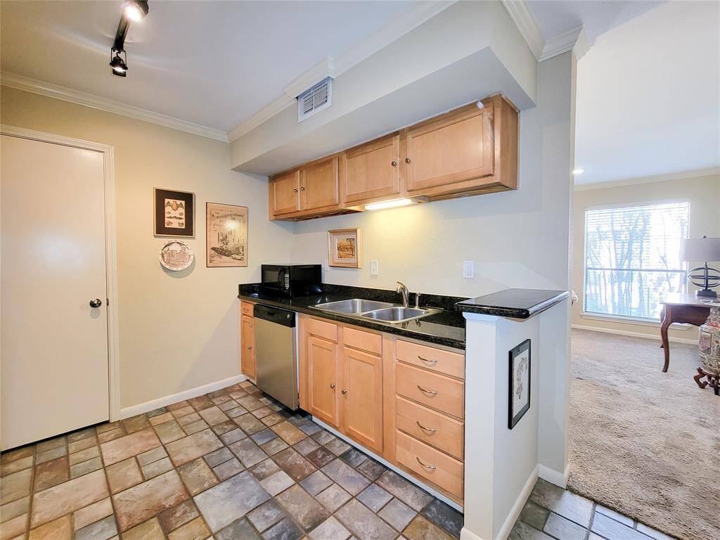 There is also a large pantry in the kitchen for more storage!