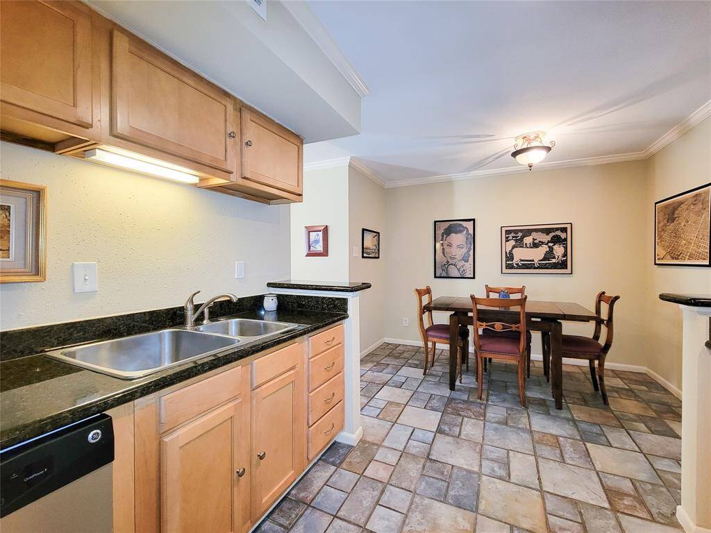 The expansive kitchen has an eat-in dining area.