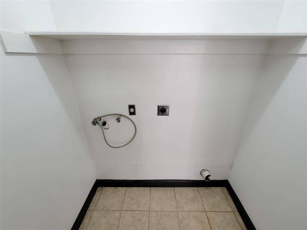 Laundry Area right next to Kitchen