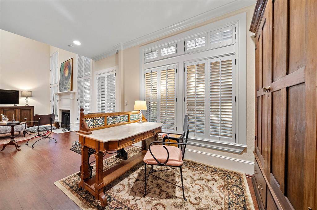 This charming study nook, featuring custom millwork and ample natural light, provides an ideal spot for work, reading, or creativity.