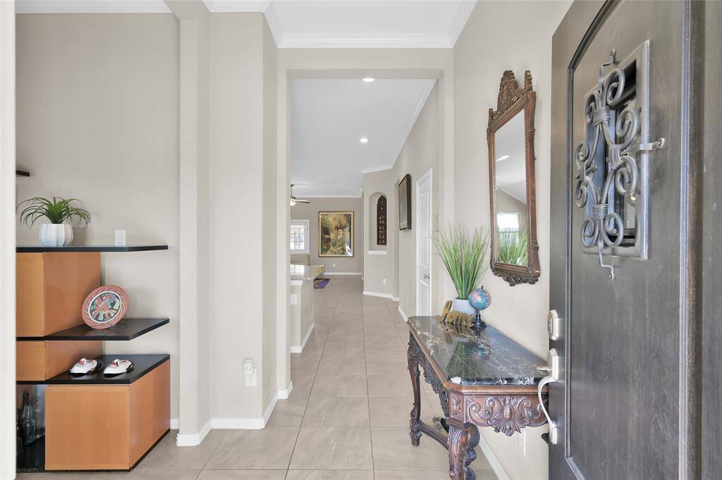 View from the front door. Office area to the immediate left, door to garage just up on the right. Kitchen/living/dining straight ahead