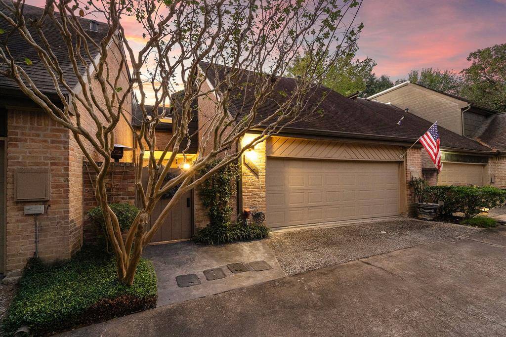 This gorgeous townhome highlights excellent curb appeal with its timeless brick exterior, mature landscaping, and spacious two-car garage. Located on a cul-de-sac in the section.