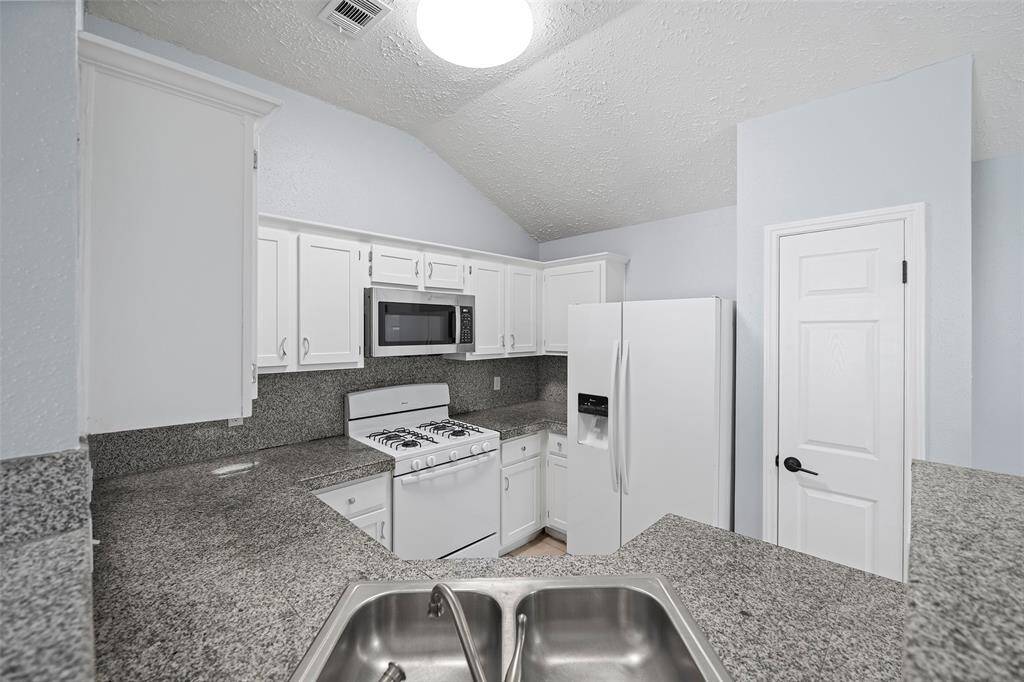 Gas range, new microwave, perfect balance of workspace and storage