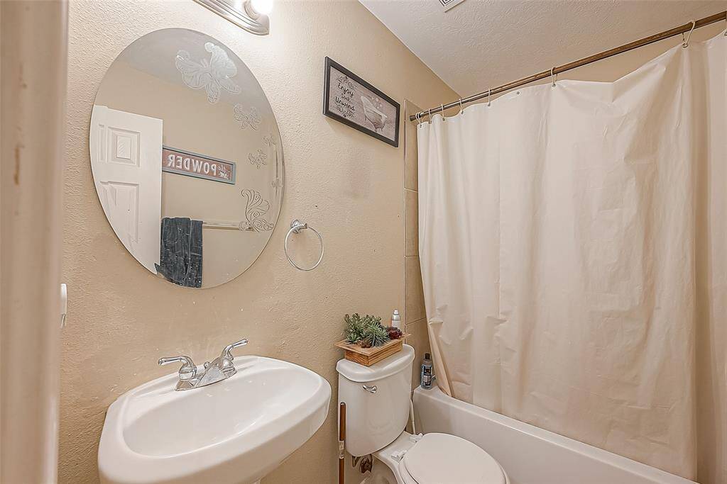 Guest bathroom is functional offering both comfort and convenience for visitors.