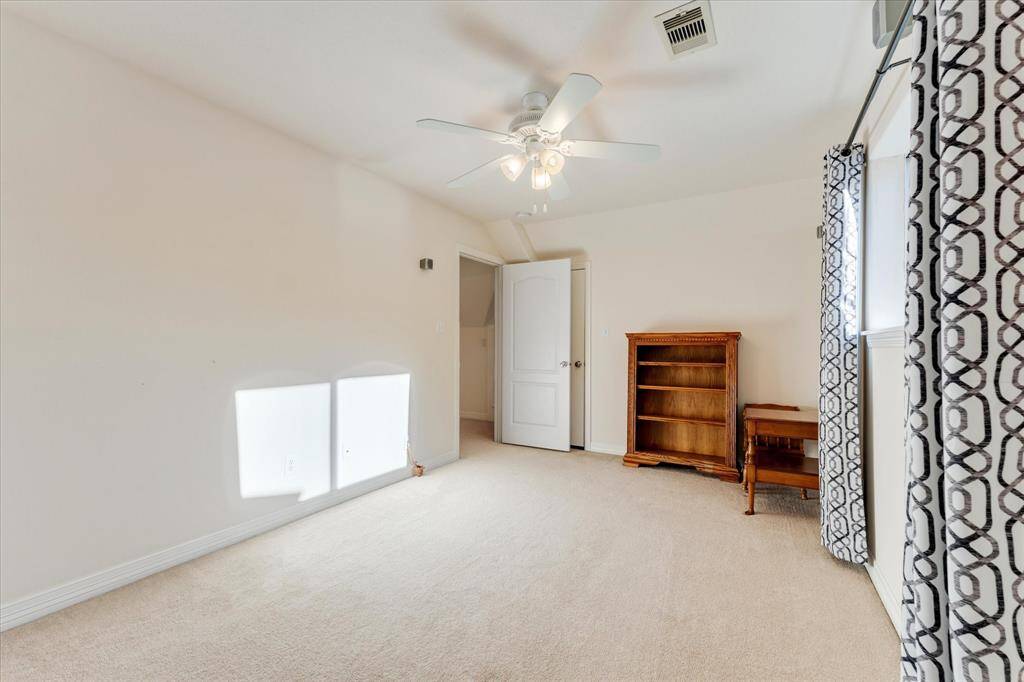 Extra room #2. . . can be used as second study, extra game room, or bedroom. Walk in access to the attic!!