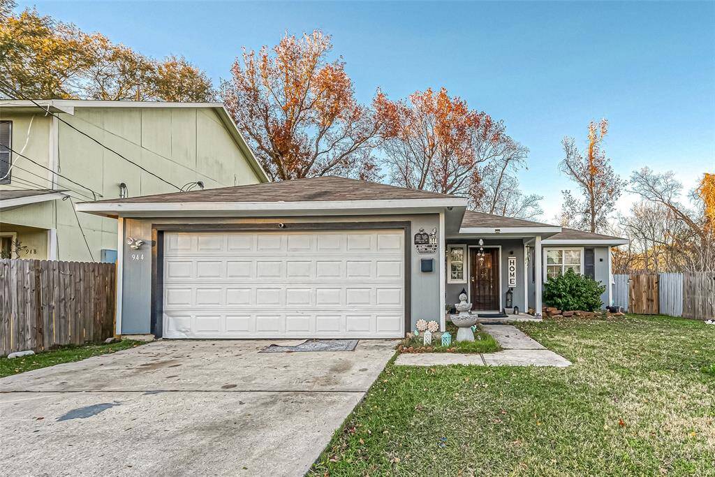 This home features a long driveway, and is finished with hardy plank siding.