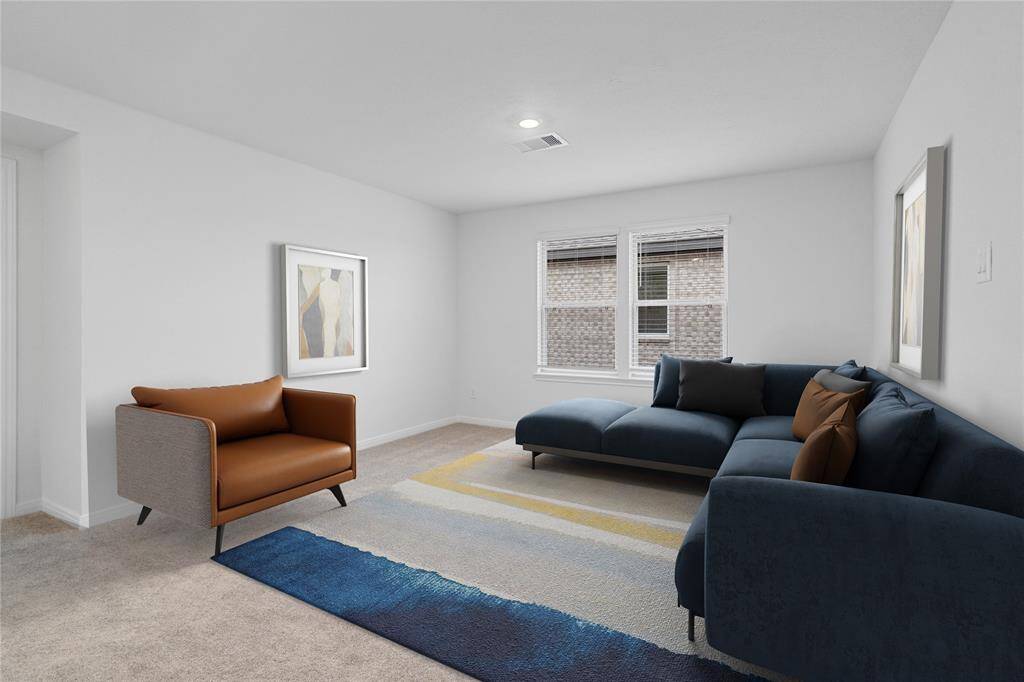 Come upstairs and enjoy a day of leisure in this fabulous loft! This is the perfect hangout spot or adult game room, this space features plush carpet, high vaulted ceiling, recessed lighting, and custom paint!
