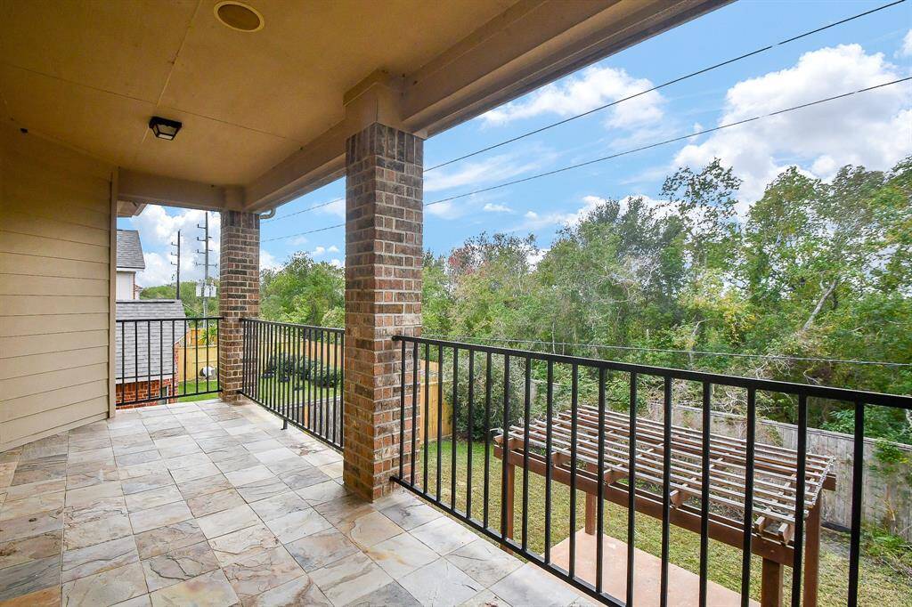 Second floor Back balcony view backs up to Kitty Hollow Park. (No back neighbors).