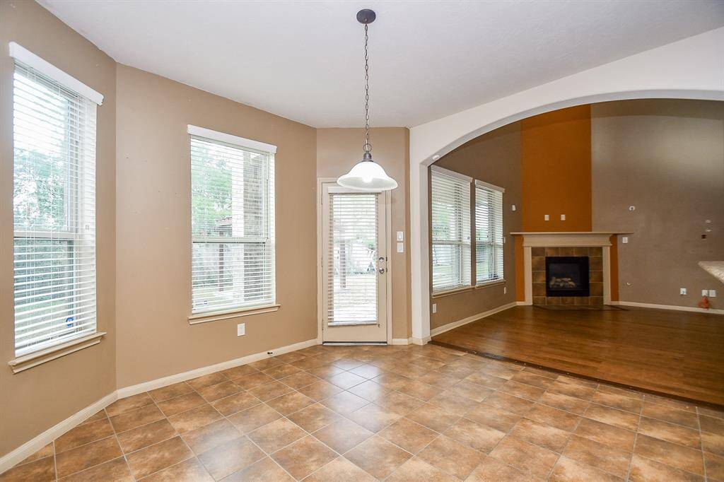 Breakfast area facing back door & family room.