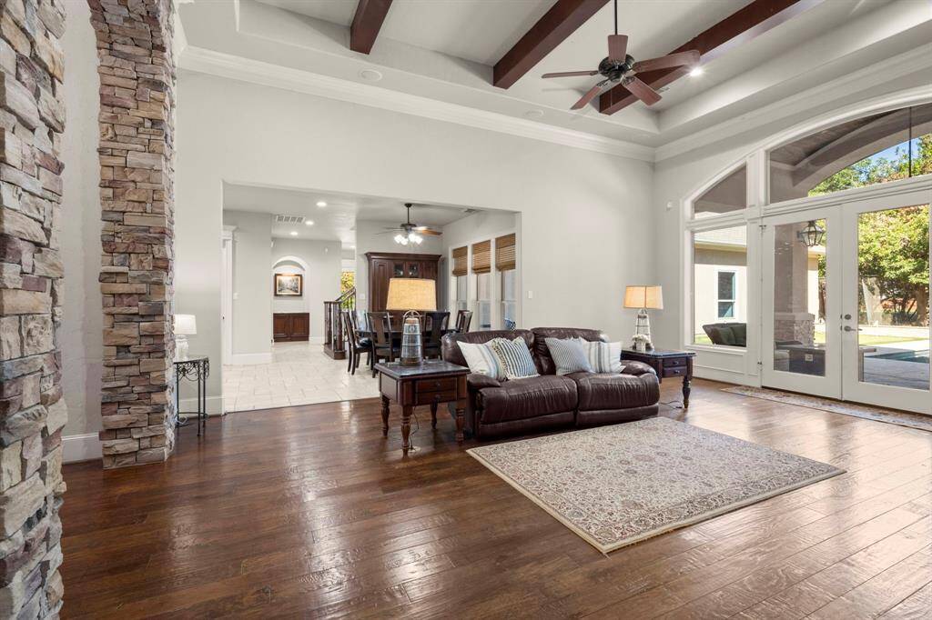 French doors to the patio are beautiful and functional.