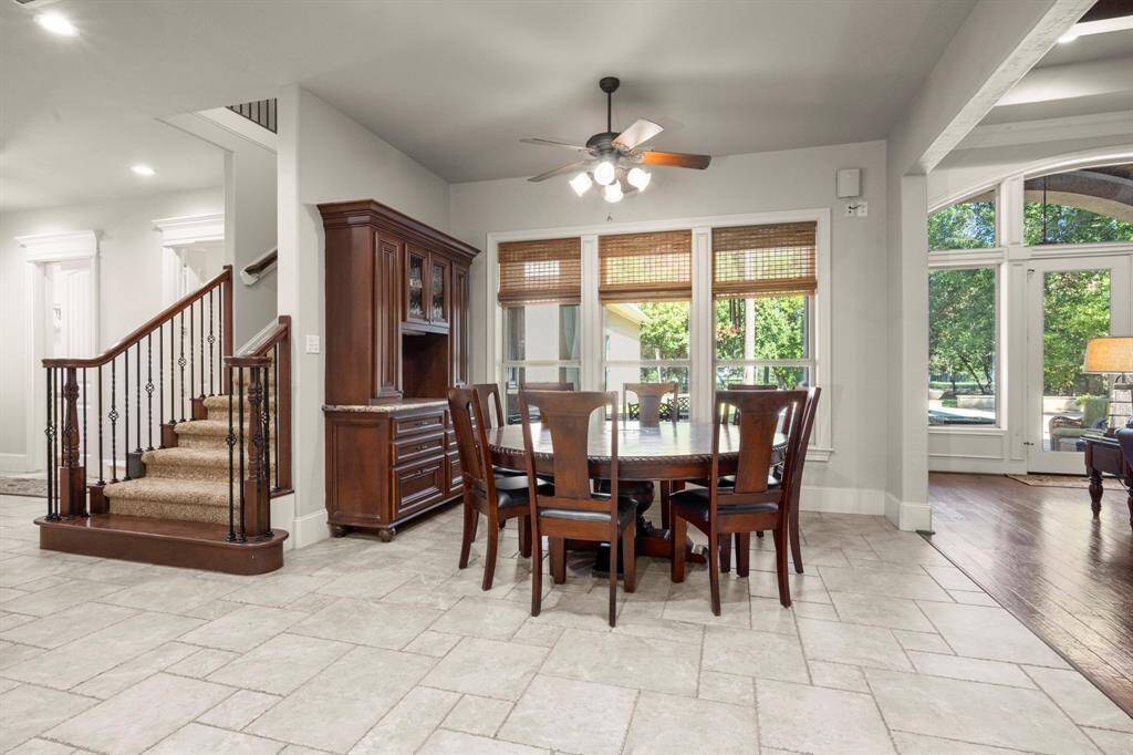 Additional cabinetry matches the kitchen and family room cabinetry. Perfect as a buffet or perhaps a wine or coffee bar.