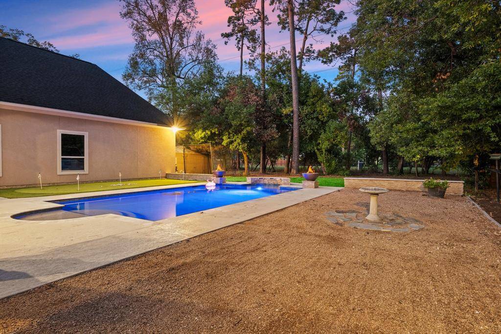 Pebble side yard is the perfect entertainment area for playing corn hole, horse shoes, and for extra table seating for guests.