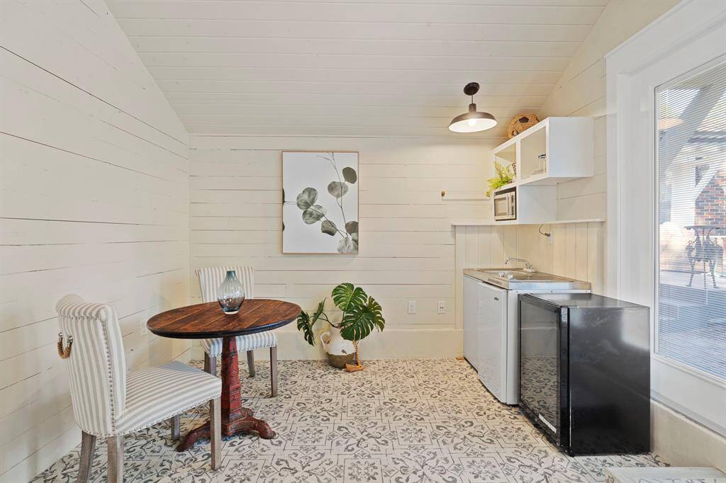 European-inspired decorative tile flooring is beautiful and easy to maintain in the studio.