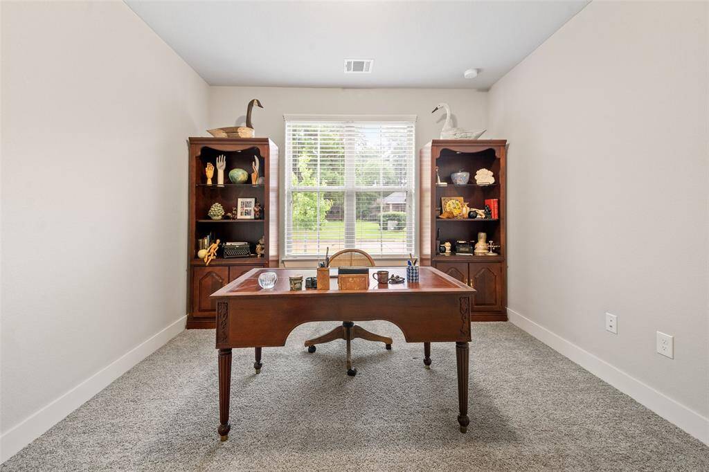 Office to the left upon entering the front door.