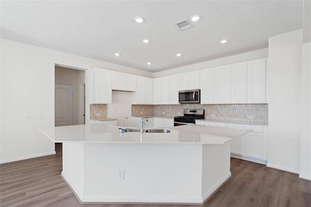 Additional view of this spacious and beautiful kitchen!