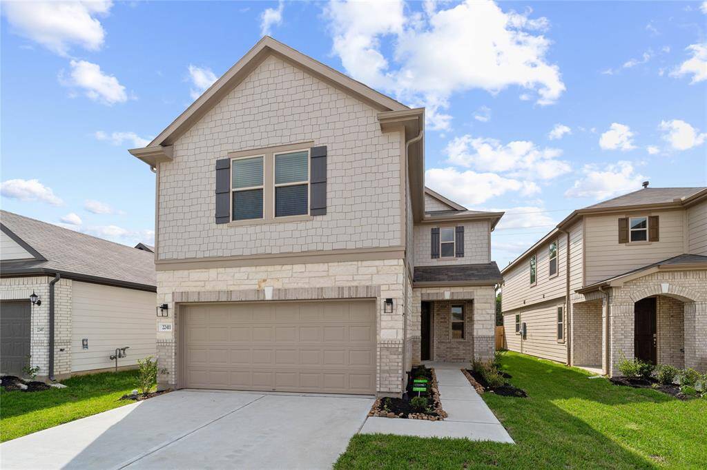 Welcome home to 22411 Hawberry Blossom Drive located in Oakwood Trails zoned to Tomball ISD.