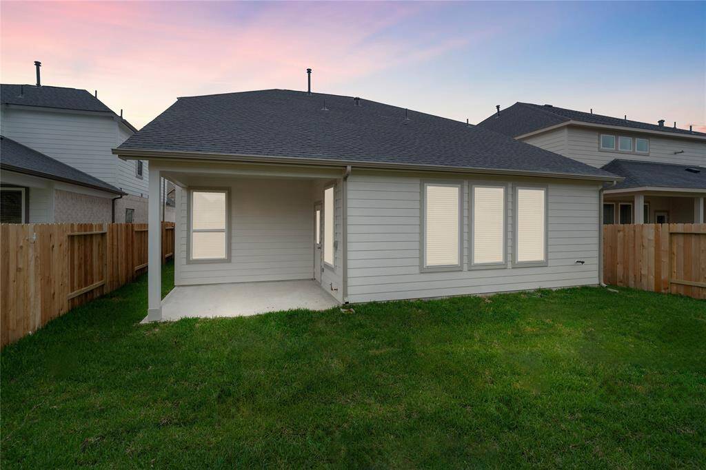 Come and see this spacious backyard and its beautiful covered patio. There is plenty of room for the kids to play and adults to relax! Perfect for your outdoor living space, patio furniture, bbq pit, and so much more. The possibilities are endless!