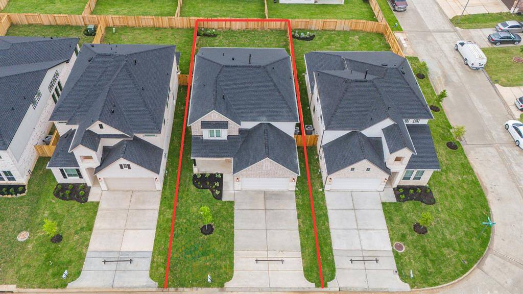 This home sits on a large lot with ample yard space in front and the back, lush landscaping and well-maintained yard!