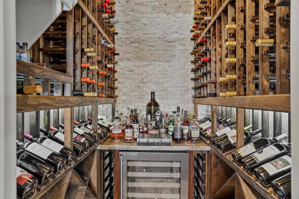 Ideal for entertaining, this home features a temperature-controlled wine room.