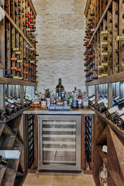 Enhance your bar experience with a built-in beverage refrigerator.