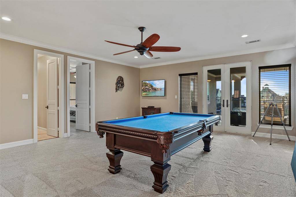Expansive room perfect for entertaining, easily accommodating a pool table.