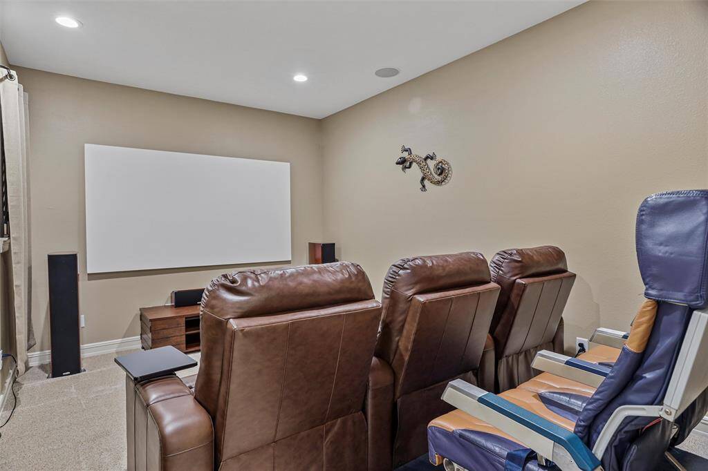 Versatile media room doubles as an additional bedroom.