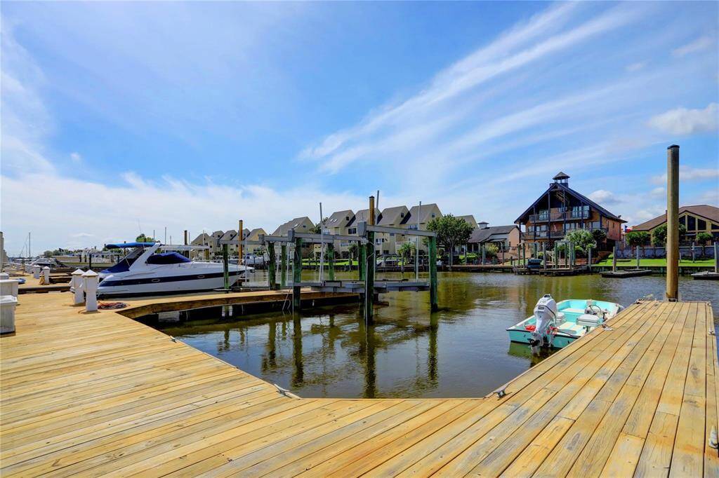 Private boat slip included for seamless waterfront living.