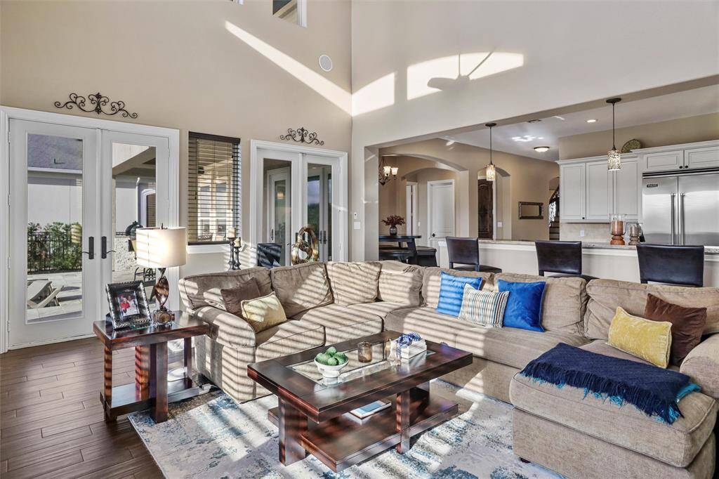 Experience seamless living with a spacious open floor plan that effortlessly connects to the kitchen.