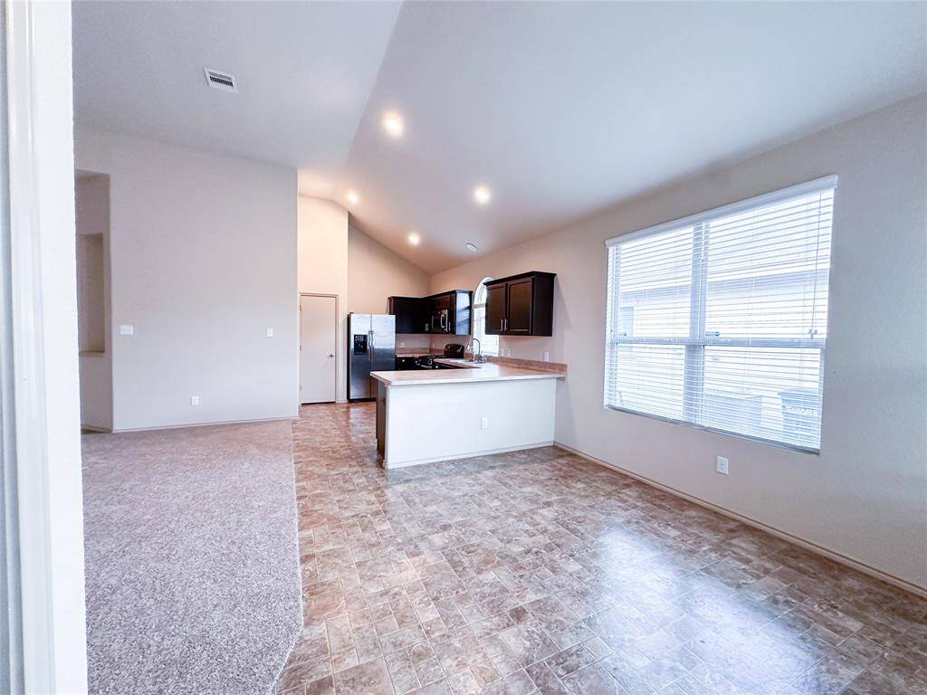 Dining space to kitchen
