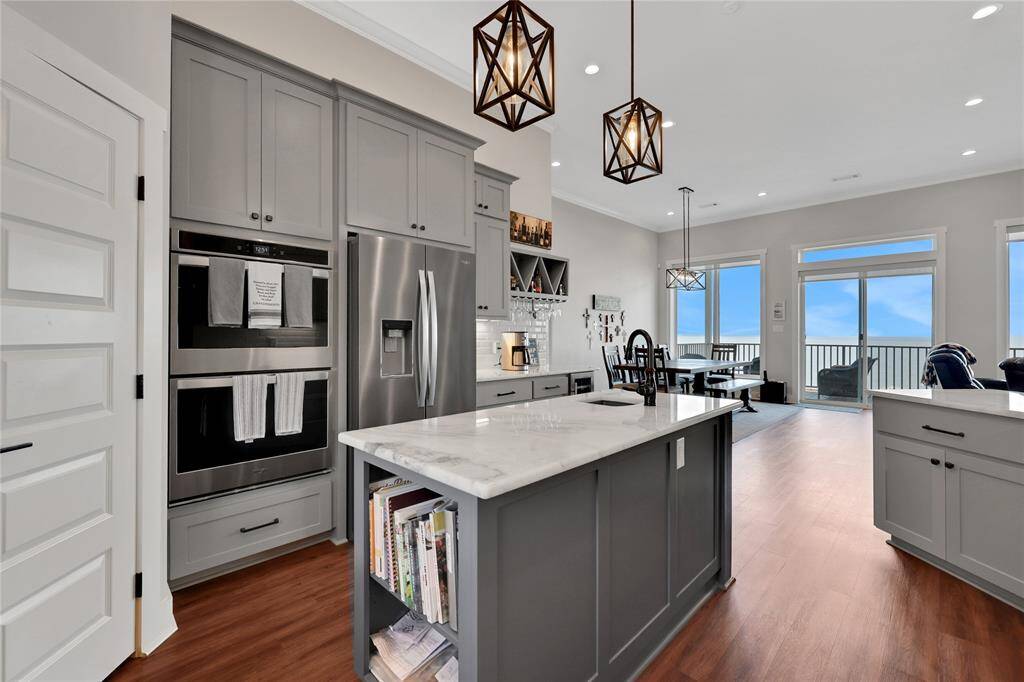 The additional bartender's sink in the island is convenient for entertaining and there is a great sized walk in pantry