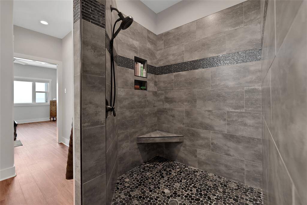 The primary shower is spacious and luxurious - you will feel like you are in your own spa!